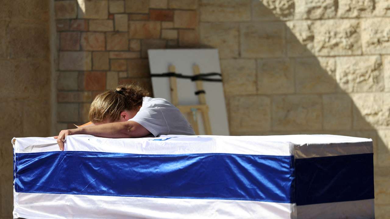 Friends and family mourn during Israeli soldier Corporal Noa Marciano's funeral, in Modiin