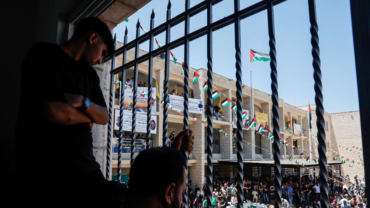 Mourners take part in the funeral of Sayfollah Kamel Musallet, killed amid the Israel-Gaza conflict, near Ramallah