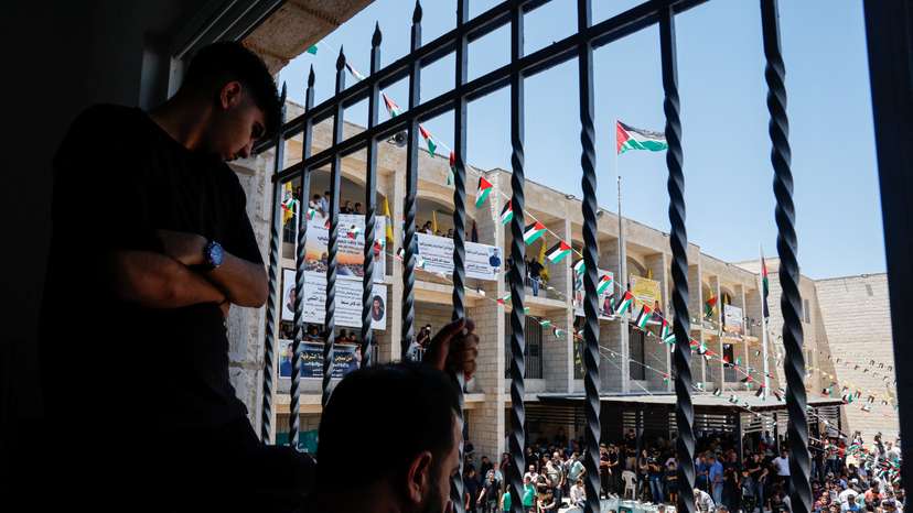 Mourners take part in the funeral of Sayfollah Kamel Musallet, killed amid the Israel-Gaza conflict, near Ramallah