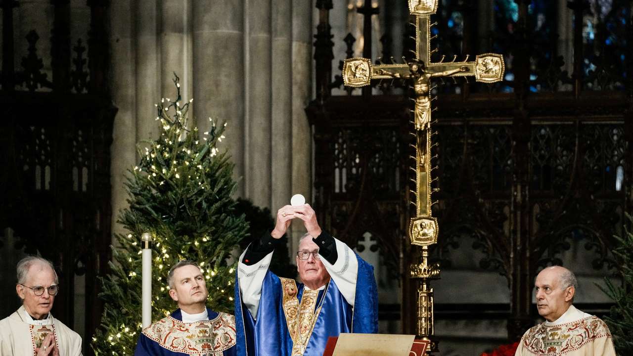 Archbishop-designate Ronald Hicks and Cardinal Timothy Dolan, outgoing Archbishop of New York, attend Mass at St. Patrick’s Cathedral, in New York