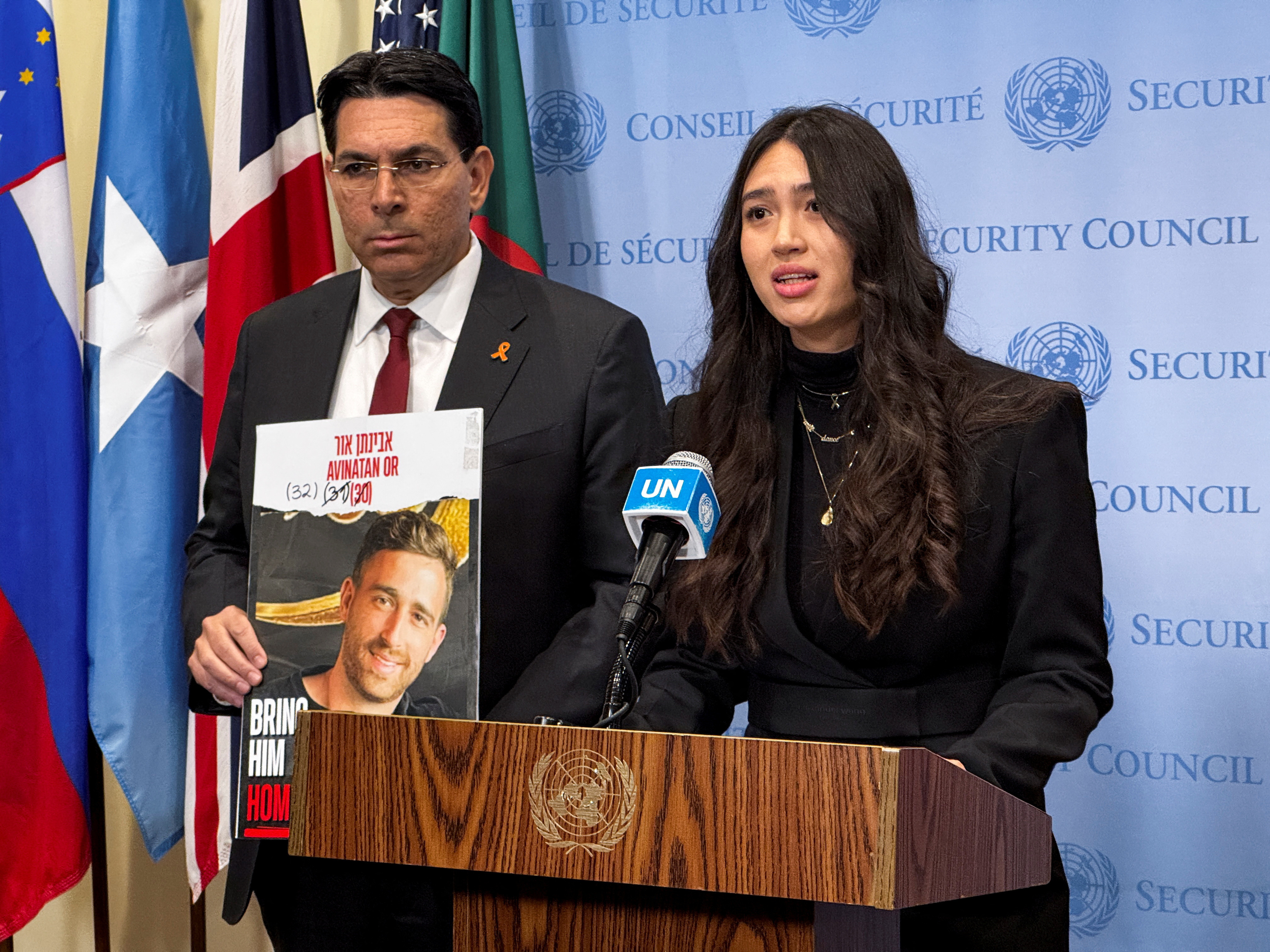 Noa Argamani, a former Israeli hostage who was kidnapped during the October 7, 2023 attack, and rescued by Israeli forces in June 2024, speaks to reporters at United Nations headquarters