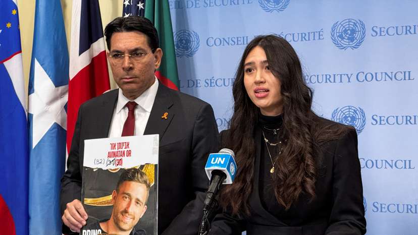 Noa Argamani, a former Israeli hostage who was kidnapped during the October 7, 2023 attack, and rescued by Israeli forces in June 2024, speaks to reporters at United Nations headquarters