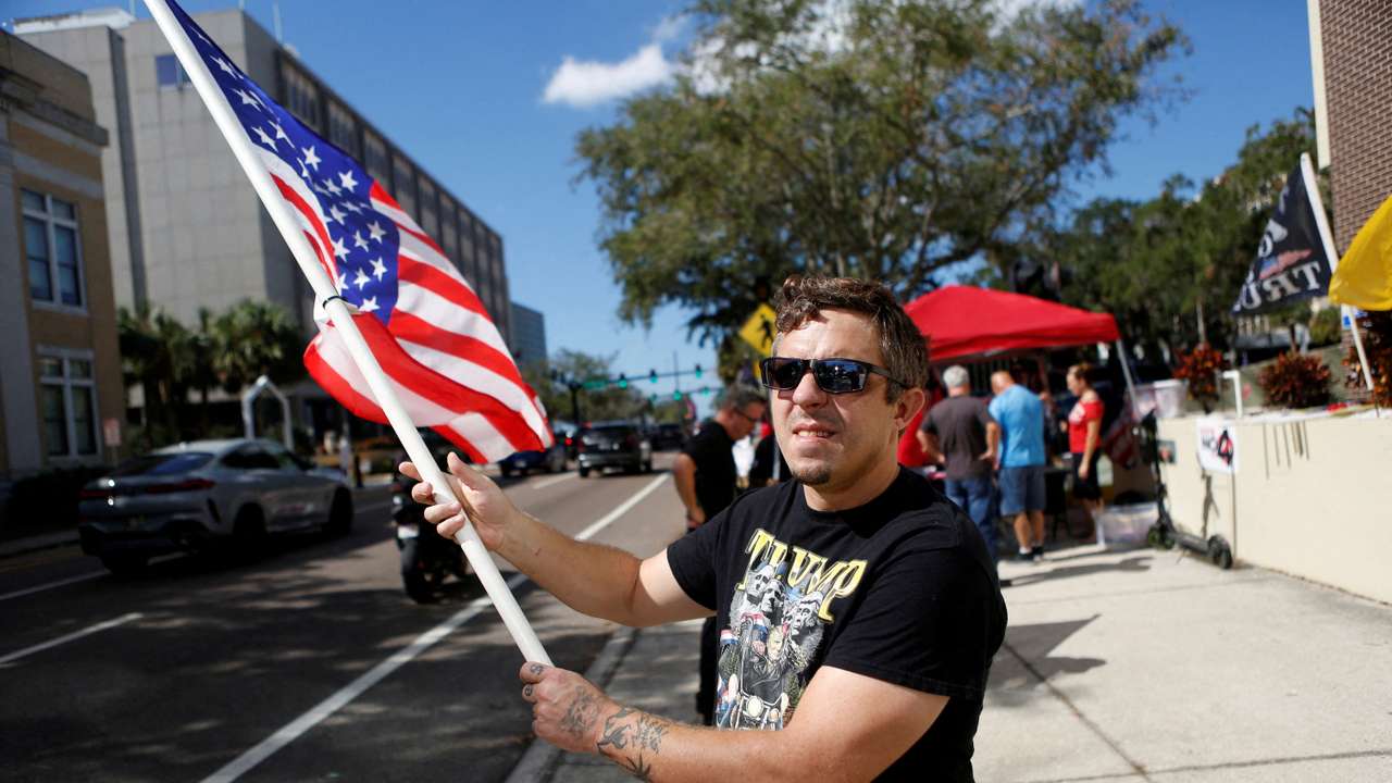 FILE PHOTO: Trump supporters rally during early voting