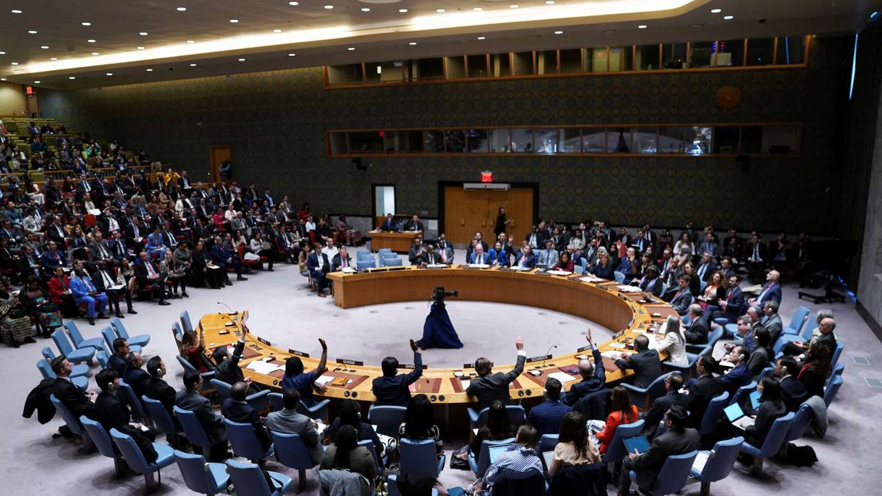 Members of the U.N. Security Council vote during a meeting on the conflict between Israel and Hamas