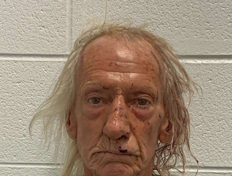 Joseph M. Czuba poses for a police booking photograph after being arrested by the Will County Sheriff's Office in Illinois