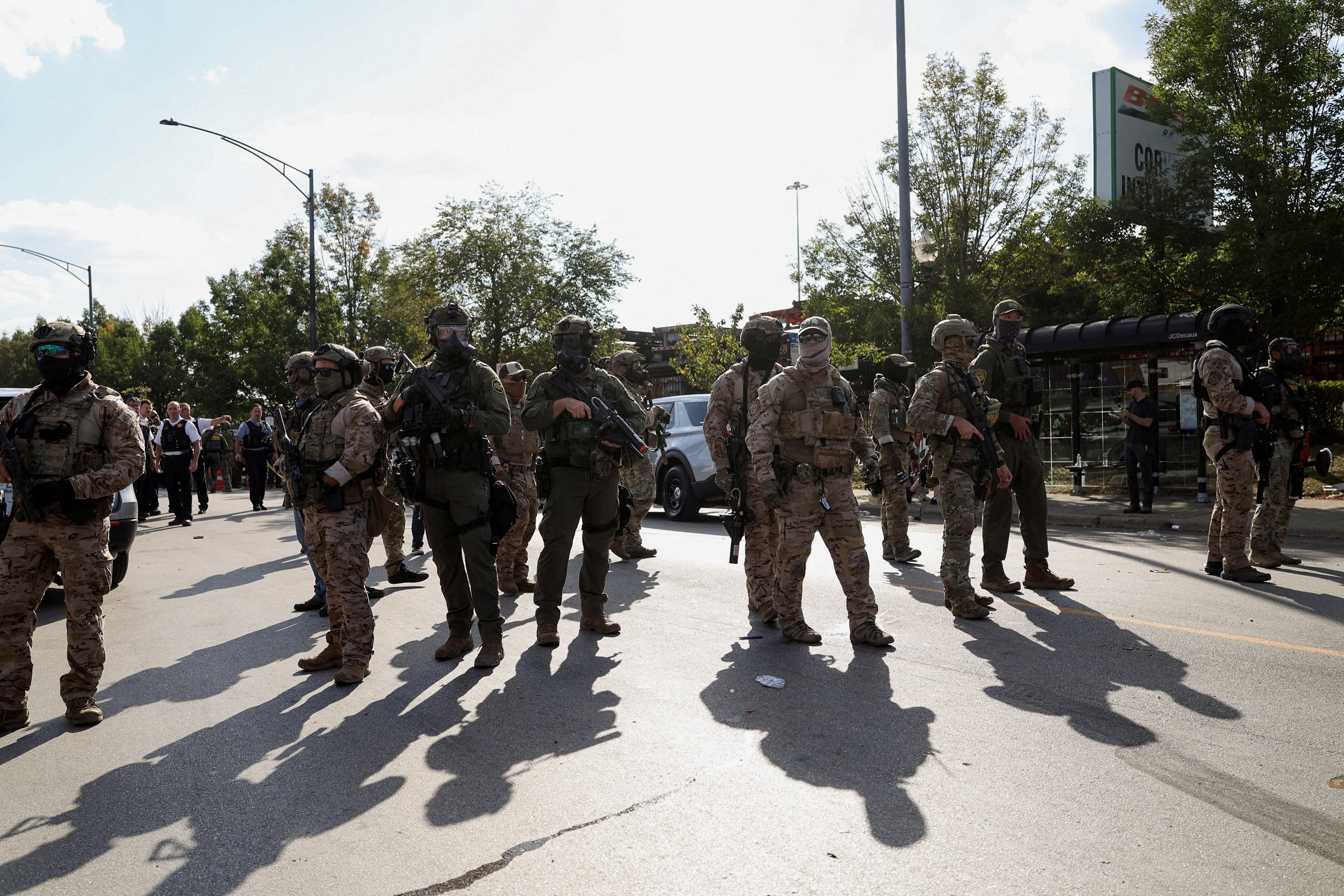FILE PHOTO: People protest during a standoff with ICE and federal officers in Chicago