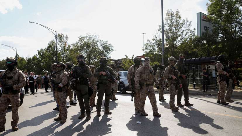 FILE PHOTO: People protest during a standoff with ICE and federal officers in Chicago