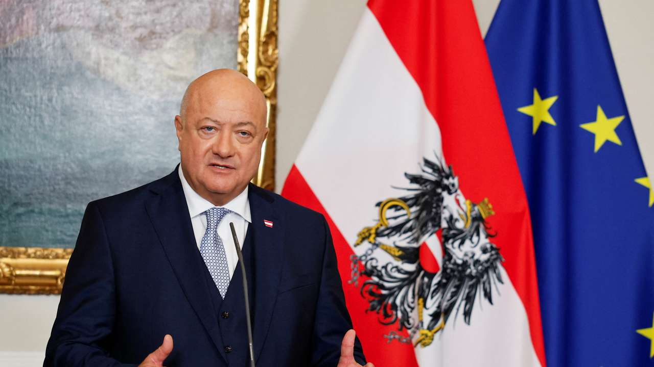 Austria's caretaker Chancellor Alexander Schallenberg hands over to his newly sworn-in successor Chancellor Christian Stocker
