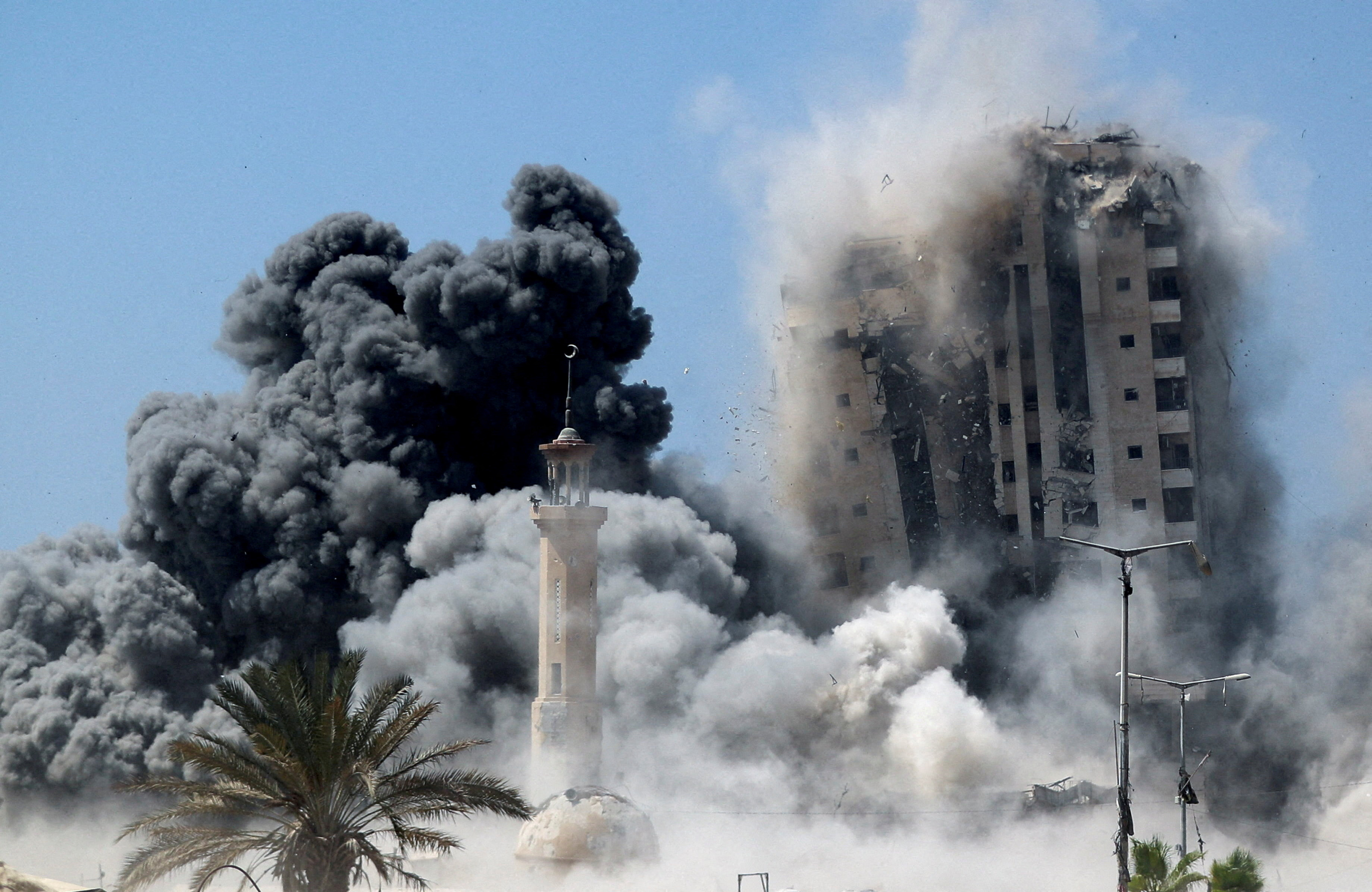 FILE PHOTO: Israeli strike hits the 15-storey Mushtaha Tower in Gaza City