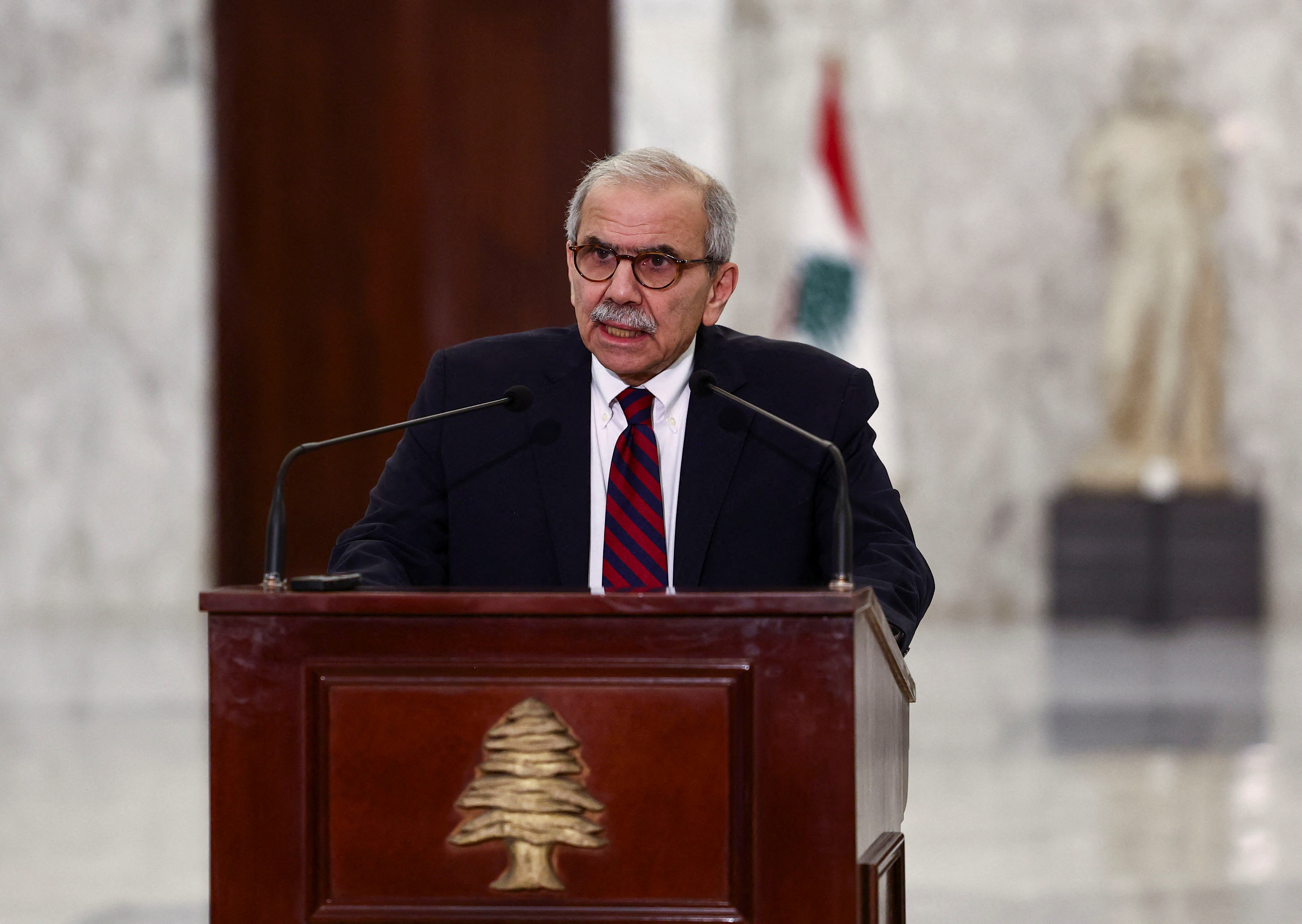 Lebanese Prime Minister Nawaf Salam speaks to the press following the formation of the new government at the presidential palace in Baabda