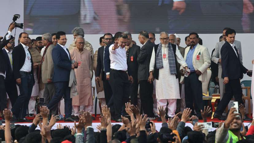 Bangladesh Nationalist Party (BNP) acting chairman Tarique Rahman waves towards his supporters, in Dhaka