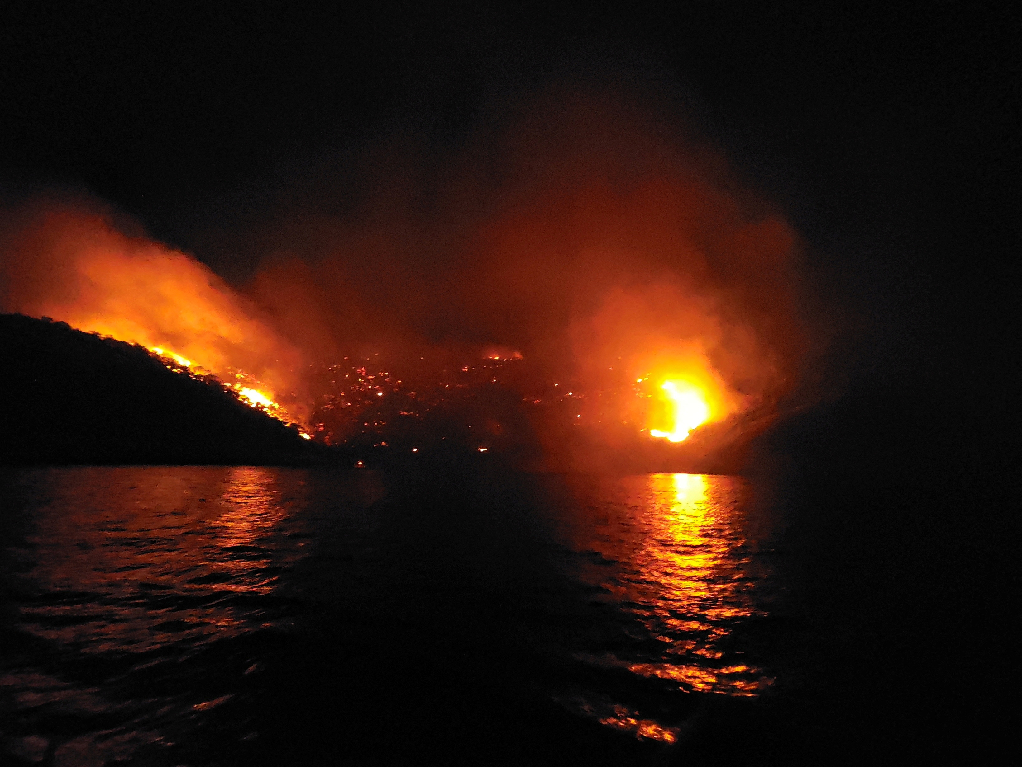 FILE PHOTO: A general view of a forest fire on the island of Hydra