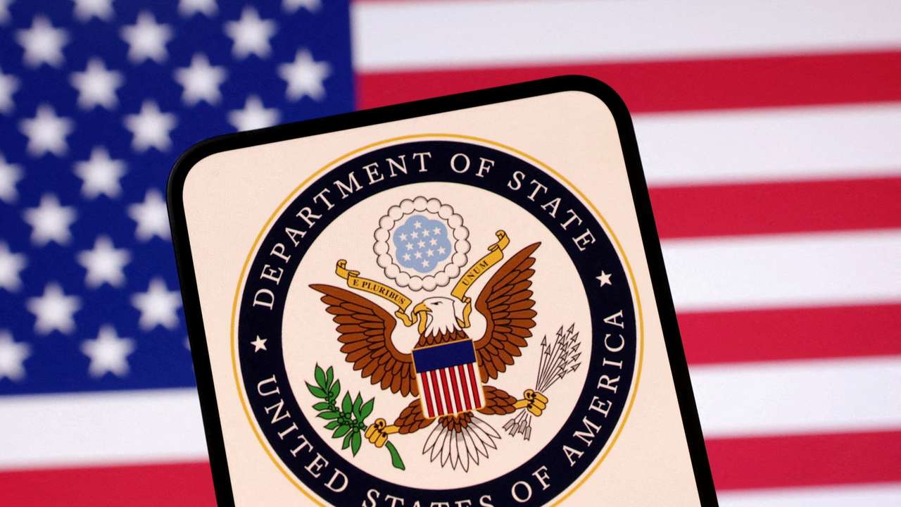 FILE PHOTO: Illustration shows United States Department of State logo and U.S. flag
