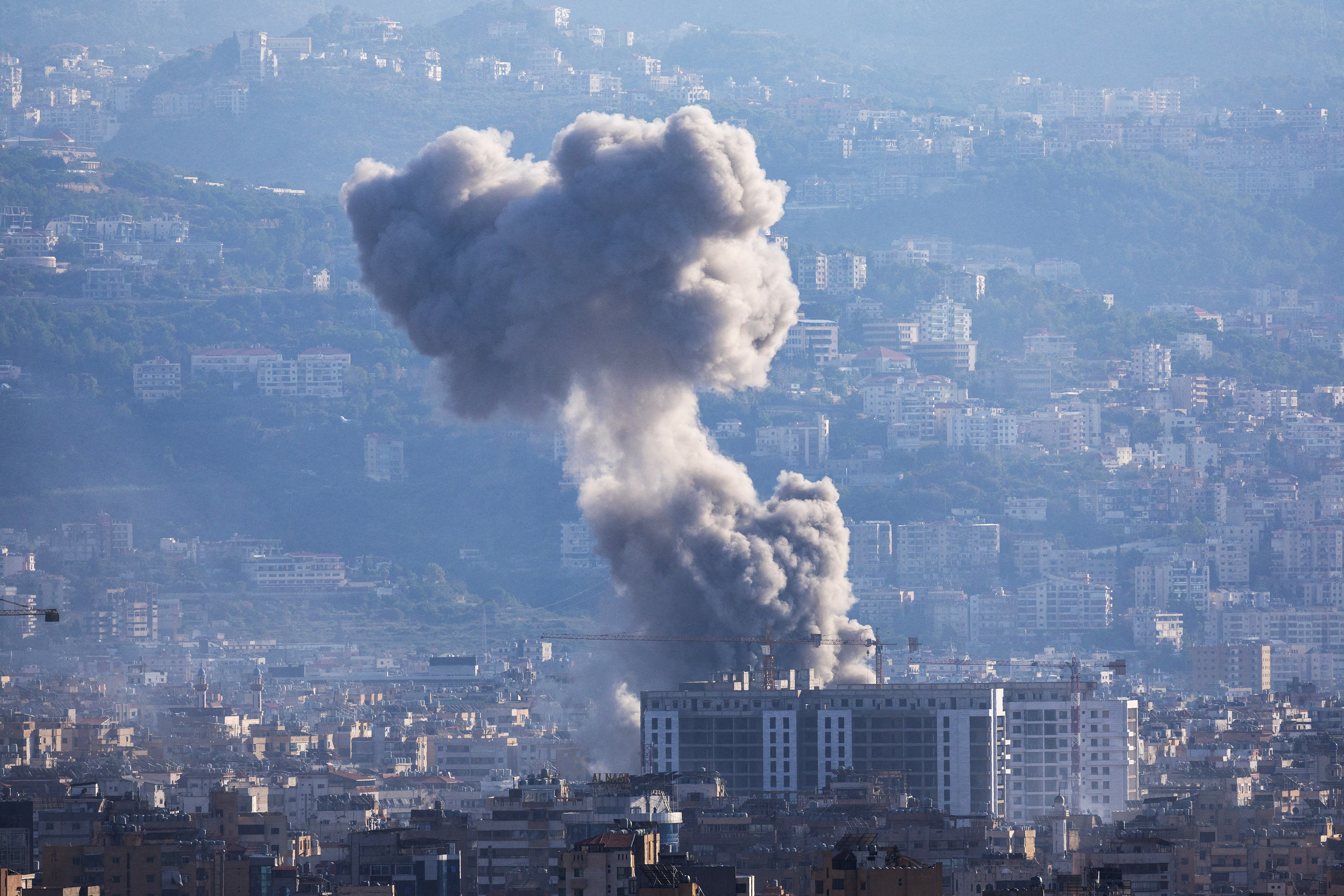 Smoke billows over Beirut's southern suburbs, after an Israeli strike