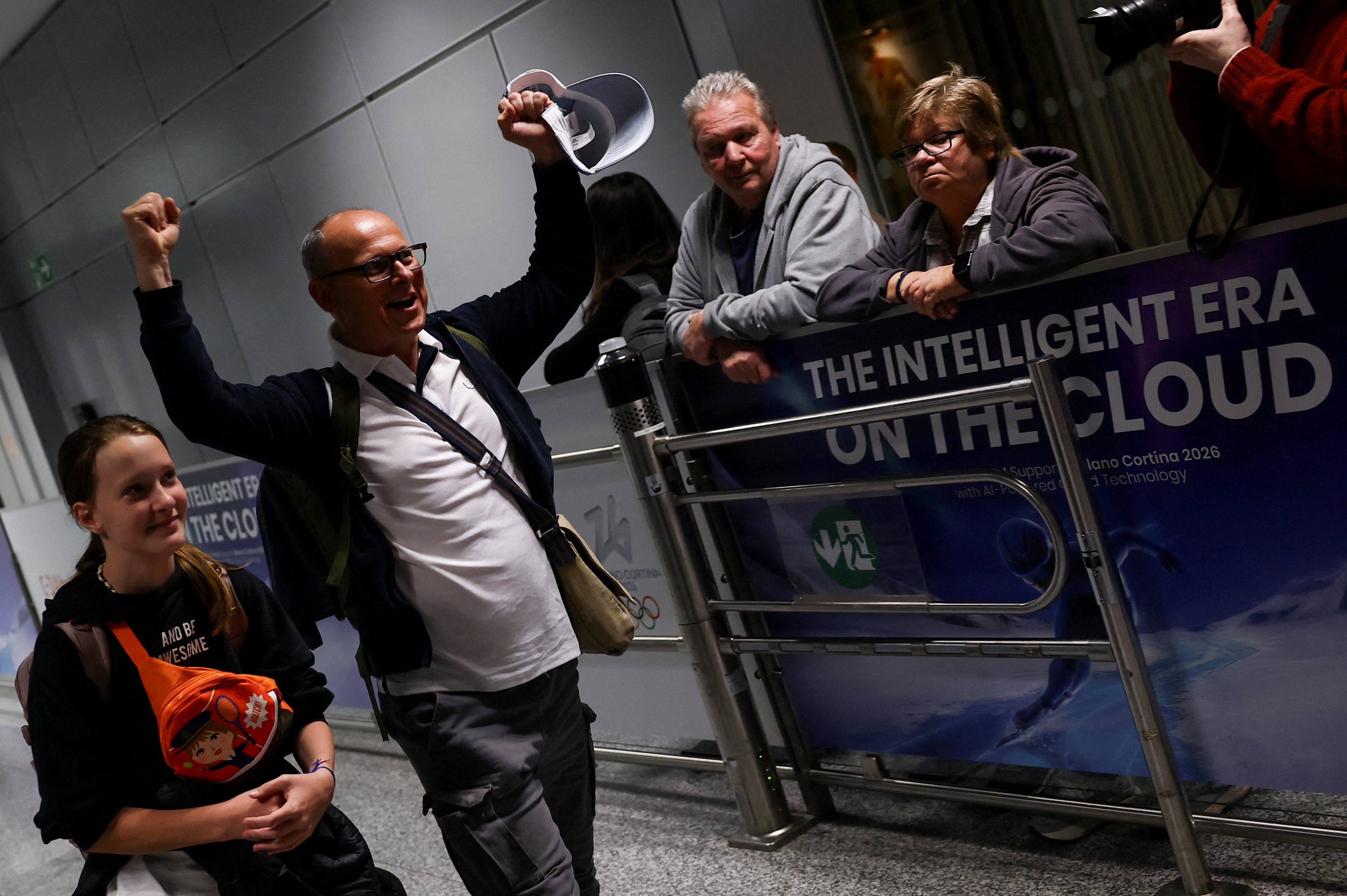 An unidentified passenger gestures following the evacuation from Dubai, in Frankfurt