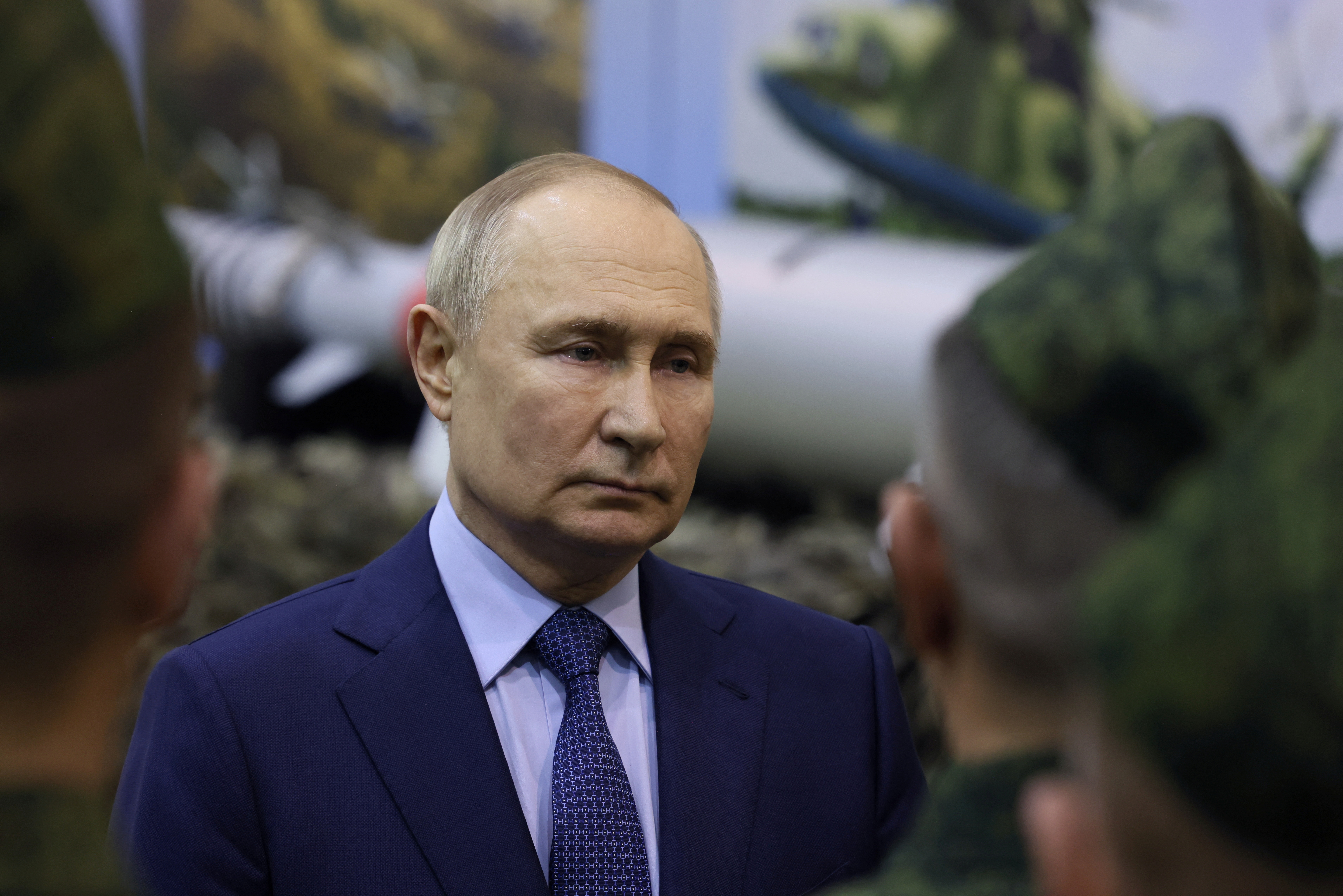Russian President Vladimir Putin meets with military pilots in Torzhok