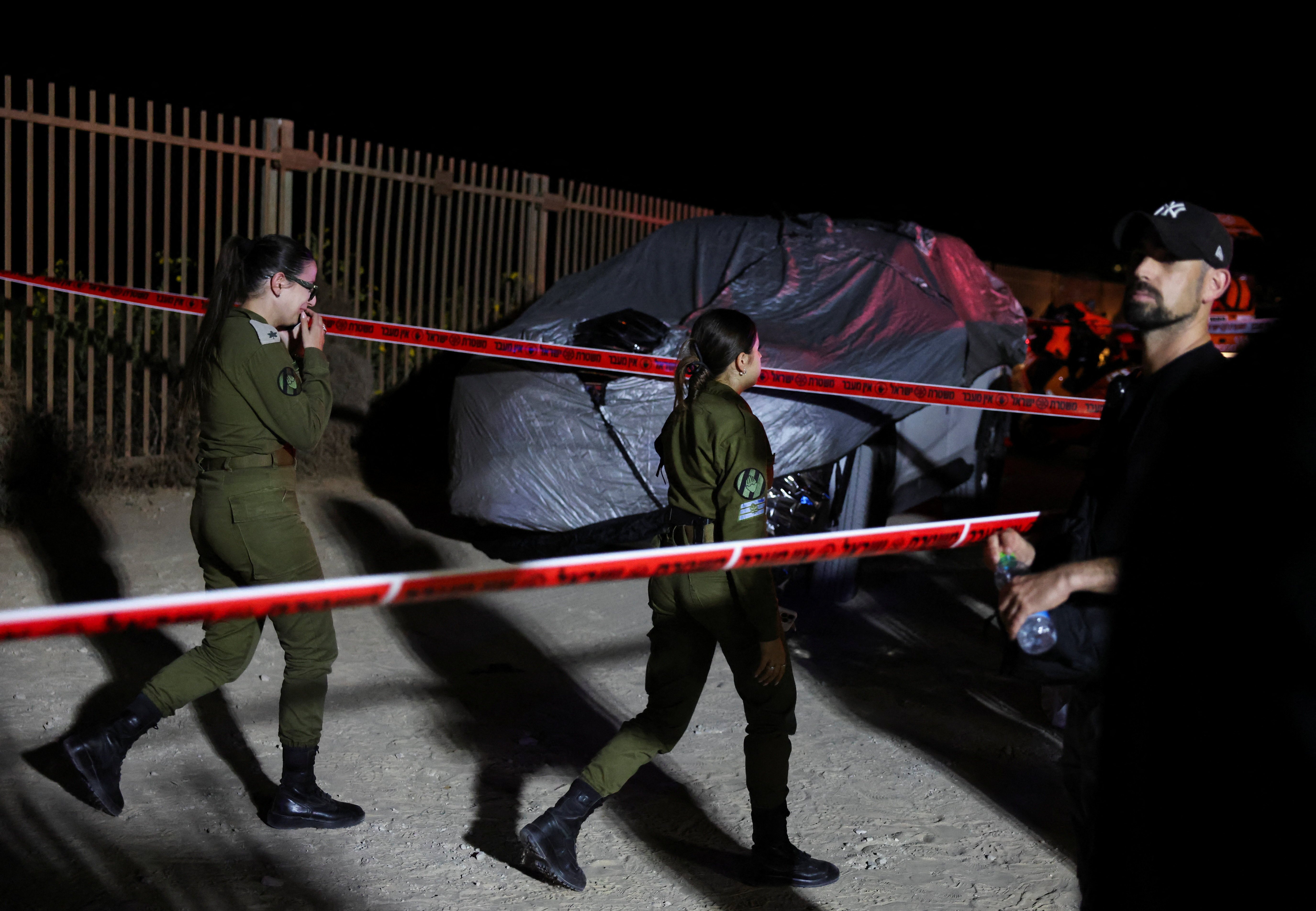 Israeli security forces gather to locate Major General Yifat Tomer-Yerushalmi, in Herzliya