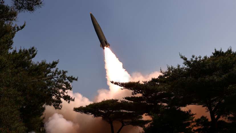 A missile is launched, as North Korea conducted a test firing of a tactical ballistic missile on Friday,
