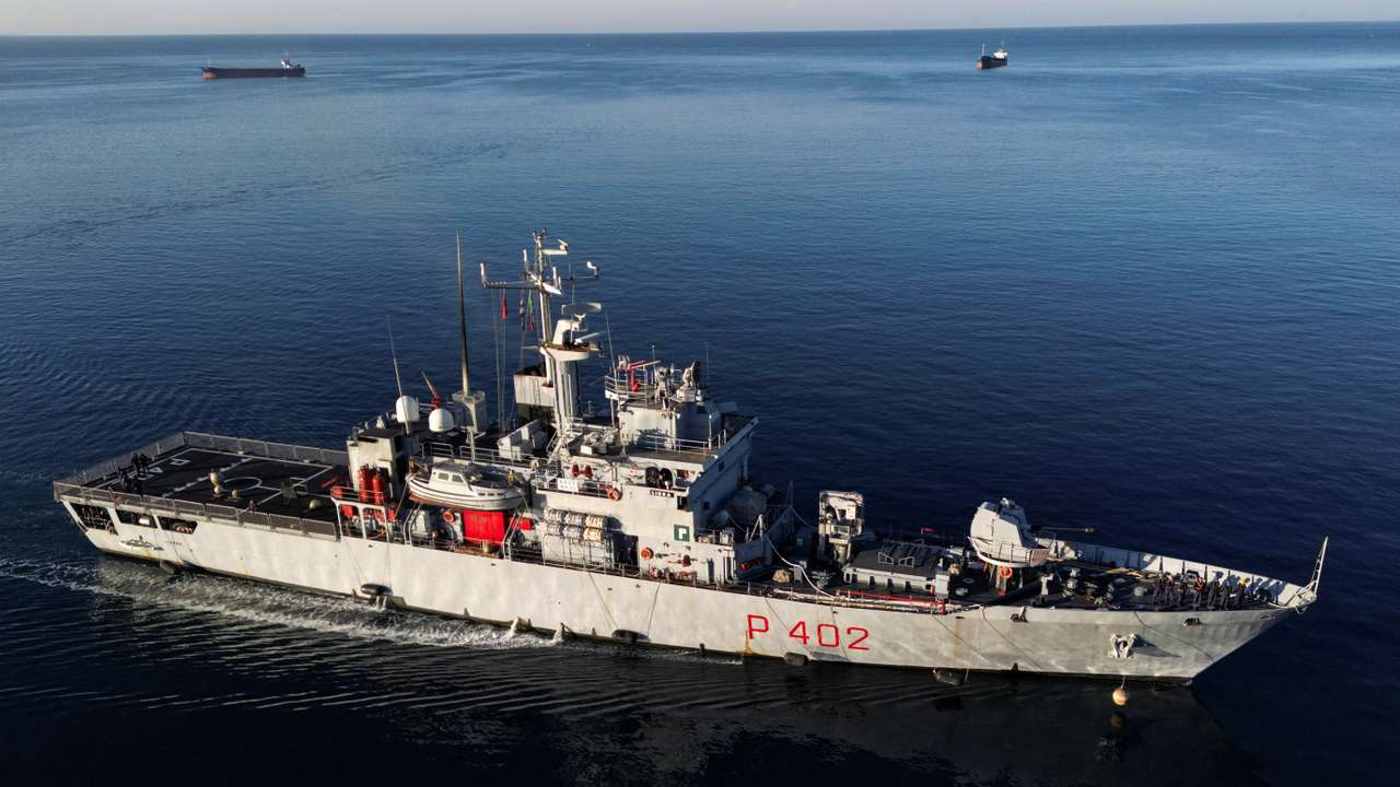 A drone view of the Italian navy ship Libra carrying migrants arriving in Shengjin