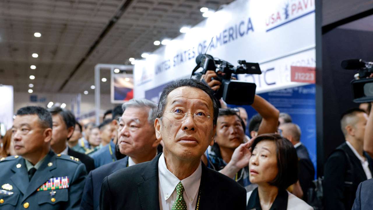 Taiwan’s Defence Minister Wellington Koo visits the United States pavilion during the Taipei Aerospace and Defence Technology Exhibition