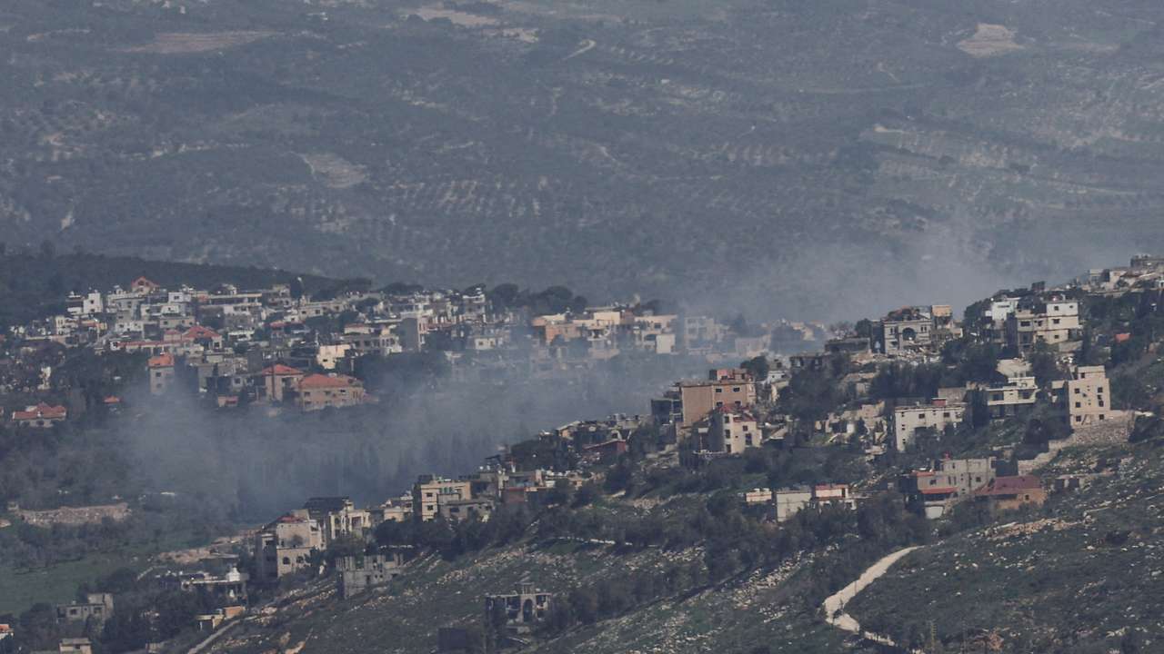 FILE PHOTO: Smoke rises from a Lebanese village near the border with Israel, amid escalation between Iran-backed Hezbollah and Israel, and amid the U.S.-Israeli conflict with Iran, as seen from northern Israel