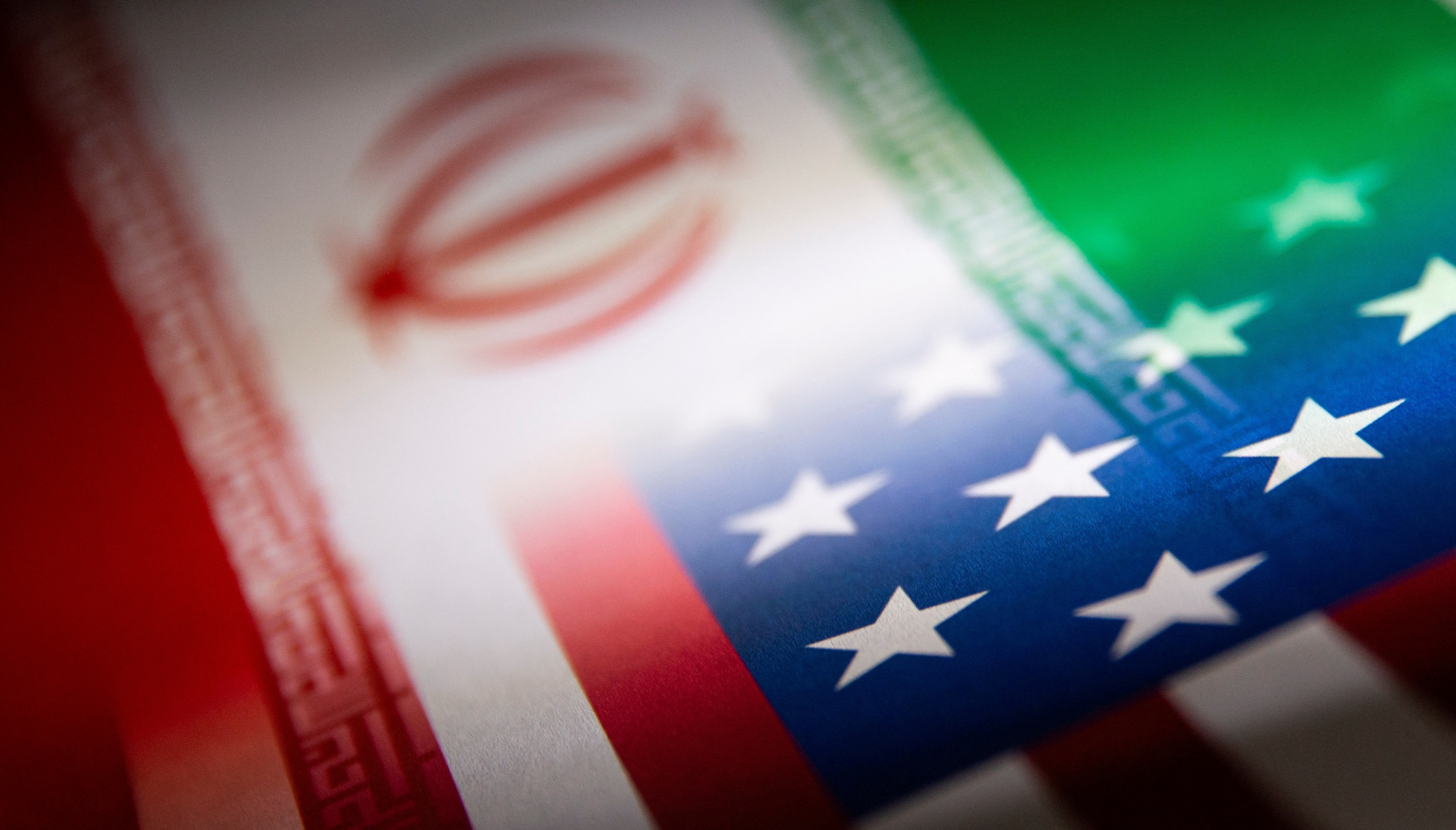 FILE PHOTO: Illustration shows Iran's and U.S.' flags