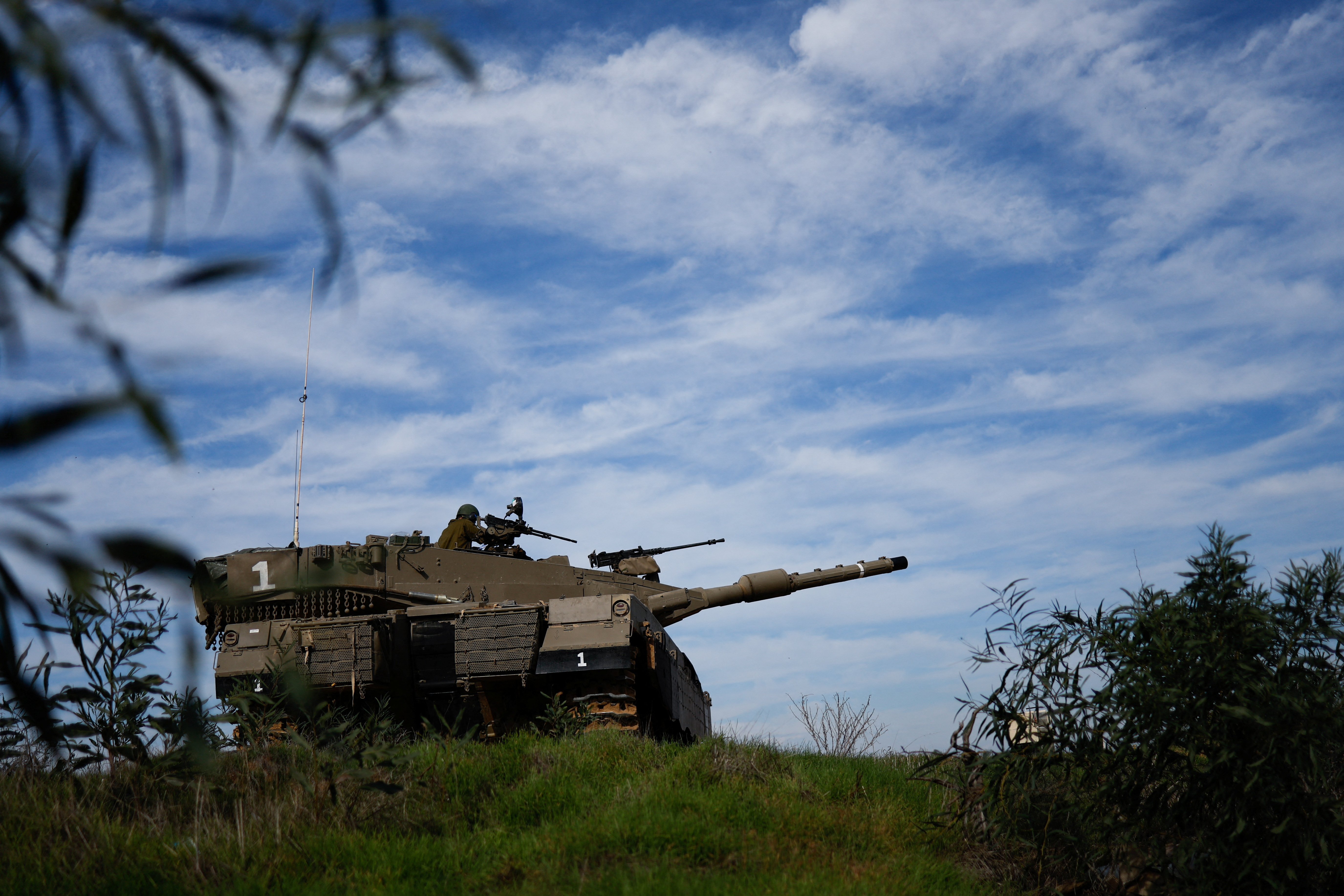 Israeli military vehicles manoeuvre at Israel-Gaza border