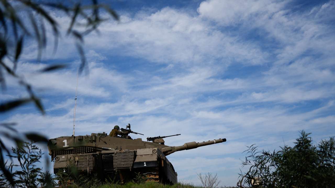 Israeli military vehicles manoeuvre at Israel-Gaza border