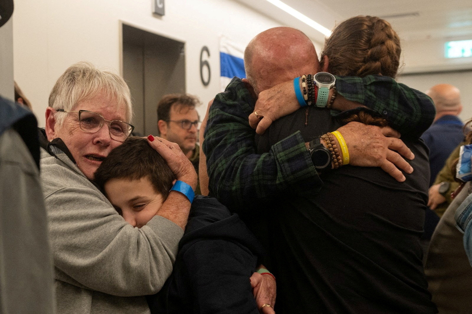 FILE PHOTO: Former hostages who were released from the Gaza Strip on November 26 are reunited with their family in Israel