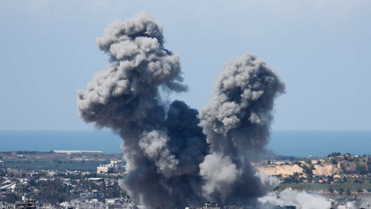 Smoke rises from Gaza during an explosion following an airstrike, as seen from Israel