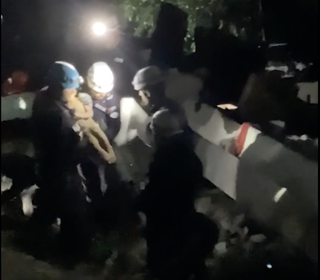 Jordanian search team plucks child alive