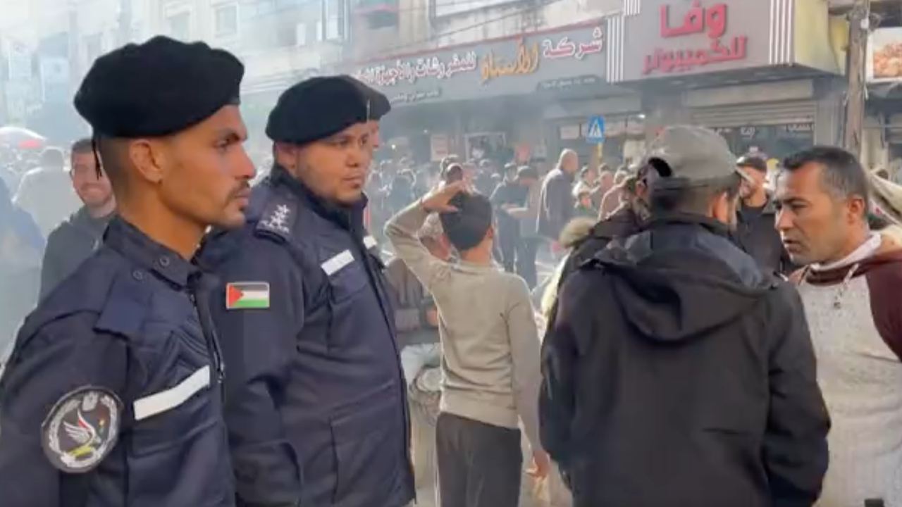 Palestinian security forces in Deir al-Balah's central market