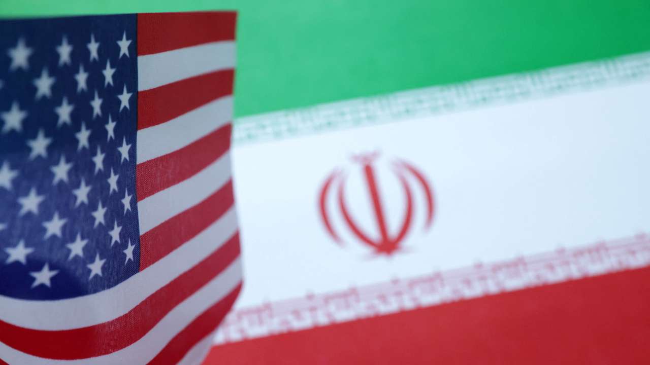 Illustration shows U.S. and Iran flags