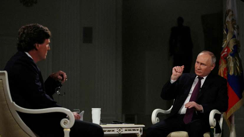 FILE PHOTO: Russian President Vladimir Putin gives interview to U.S. television host Tucker Carlson in Moscow