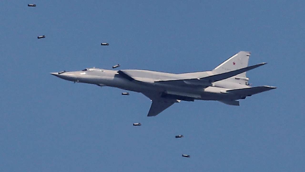 FILE PHOTO: A Tupolev Tu-22M3 strategic bomber drops bombs during the Aviadarts competition at the Dubrovichi range outside Ryazan