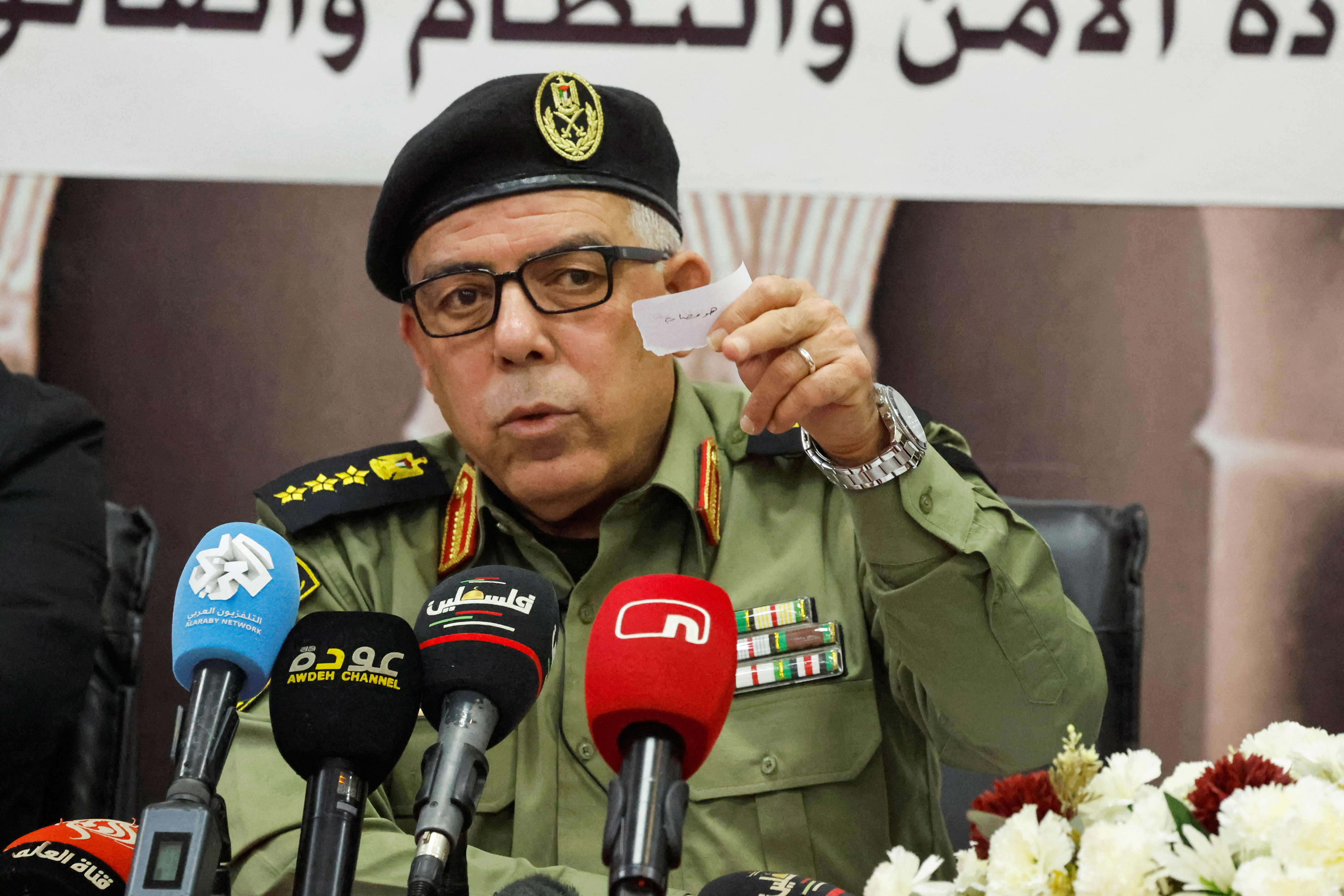 Brigadier General Anwar Rajab, spokesperson of the Palestinian security forces, attends a press conference