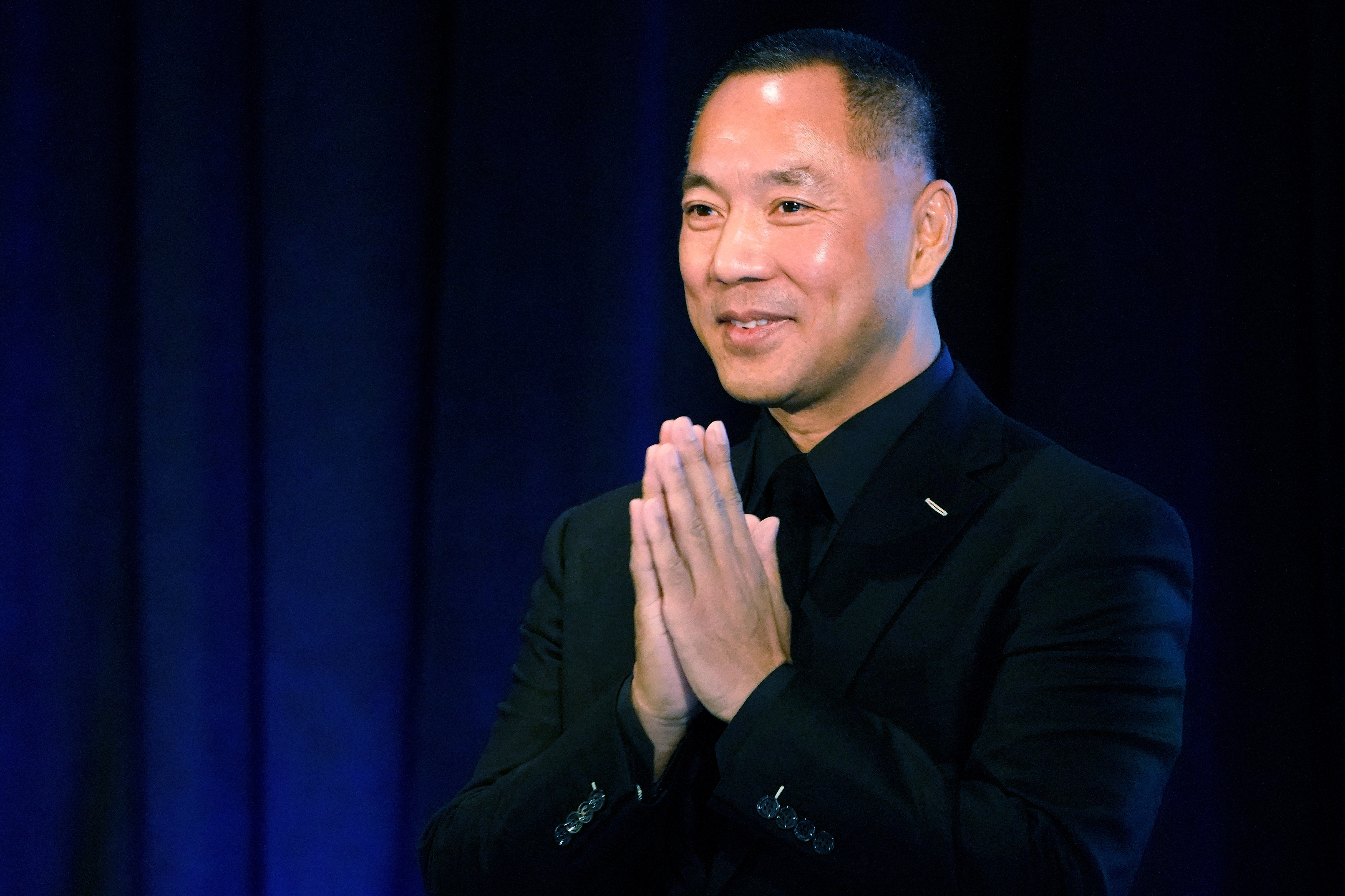 FILE PHOTO: Guo Wengui (also known as Miles Kwok) holds a news conference with Steve Bannon in New York