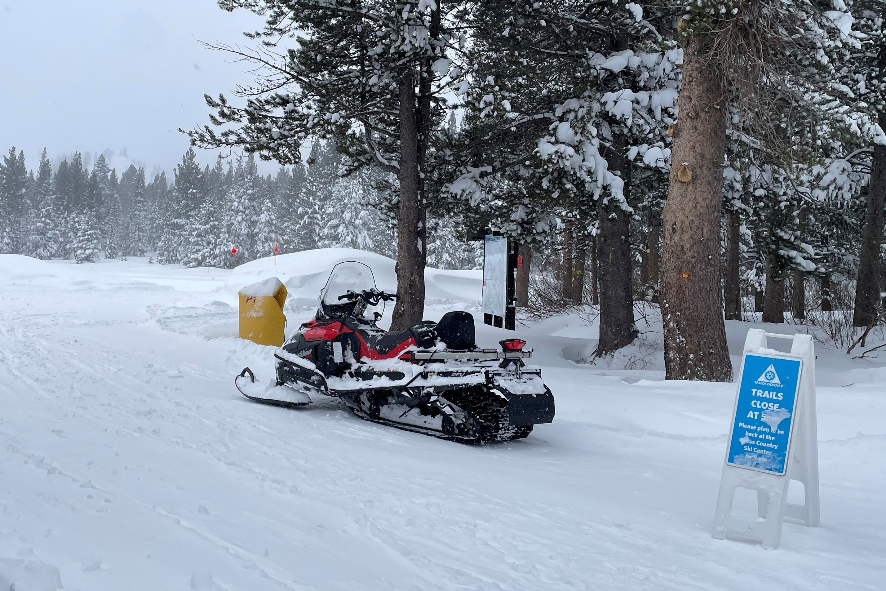 Rescue teams deploy to the site of an avalanche in a backcountry slope of California's Sierra Nevada mountains