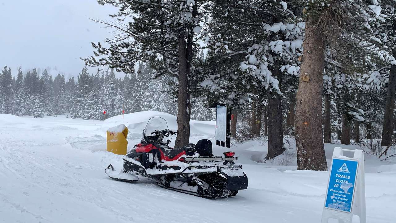 Rescue teams deploy to the site of an avalanche in a backcountry slope of California's Sierra Nevada mountains