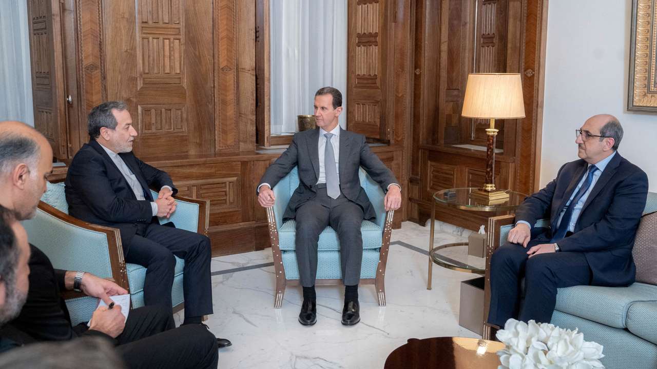 Syria's President Bashar al-Assad meets with Iran's Foreign Minister Abbas Araghchi, in Damascus