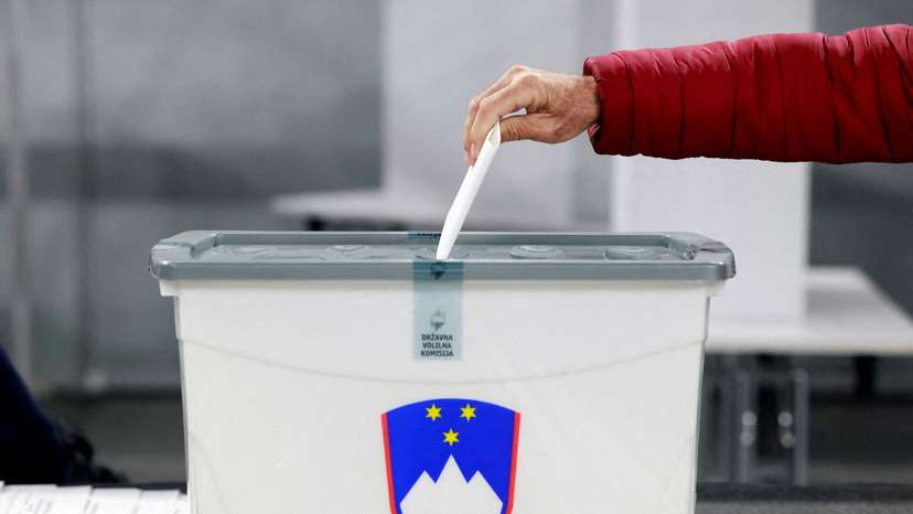 A person votes early in the Slovenian National elections