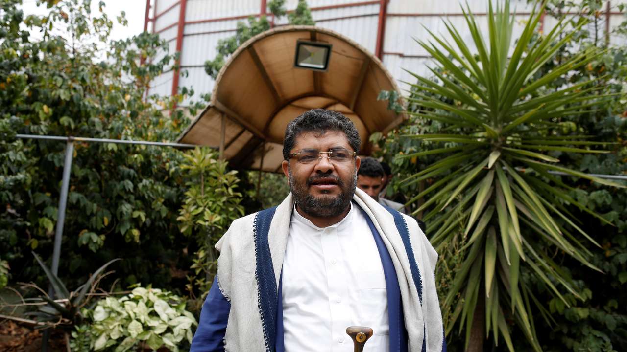 Mohamed Ali al-Houthi, head of the Houthi supreme revolutionary committee, walks after an interview with Reuters in Sanaa