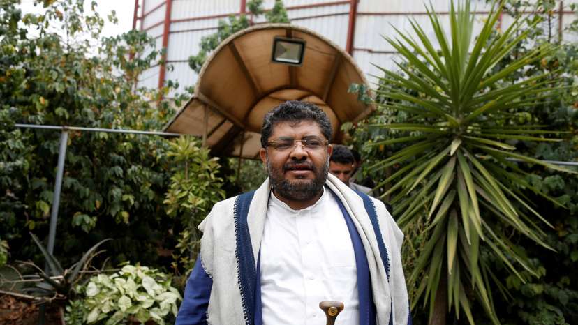 Mohamed Ali al-Houthi, head of the Houthi supreme revolutionary committee, walks after an interview with Reuters in Sanaa