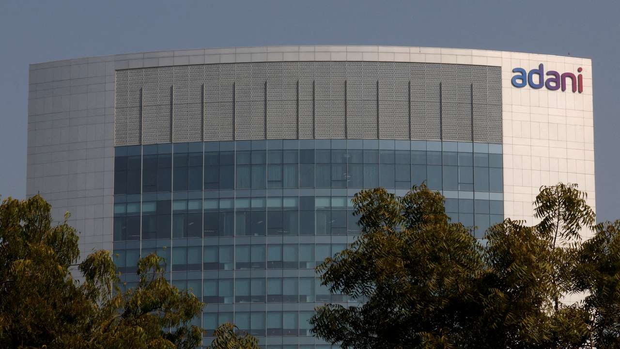 FILE PHOTO: The logo of the Adani Group is seen on the facade of its Corporate House on the outskirts of Ahmedabad