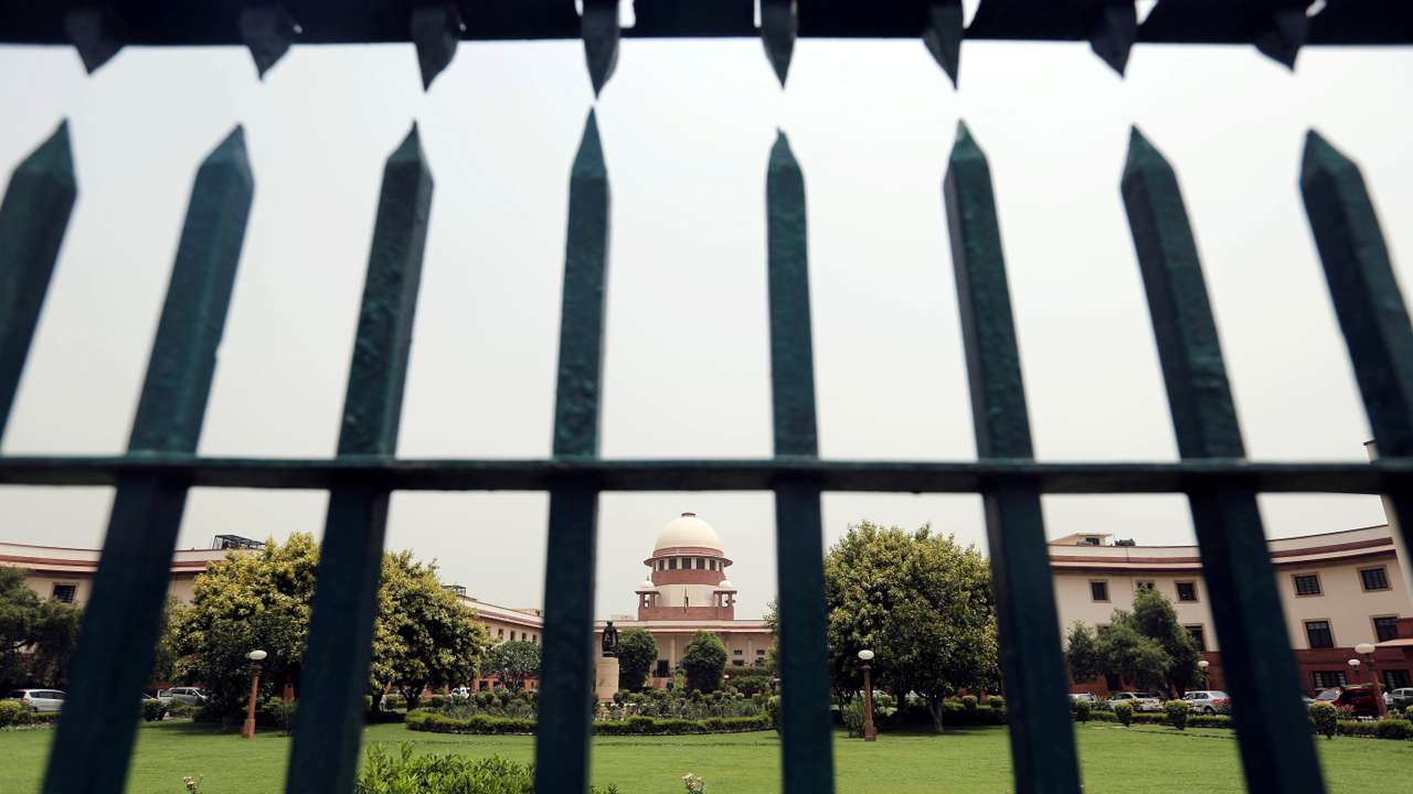 India's Supreme Court is pictured through a gate in New Delhi