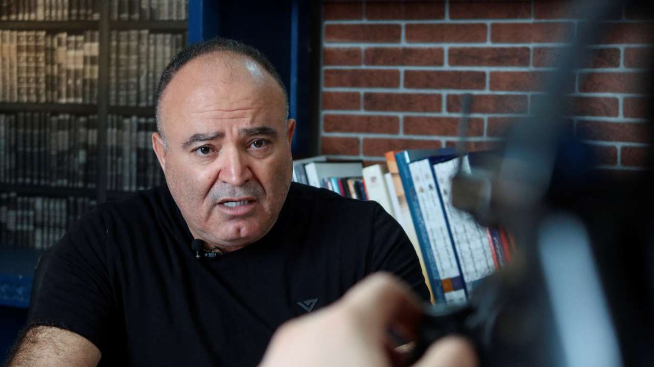 Tunisian prominent journalist Mohamed Boughalleb speaks during the filming of his show in Tunis
