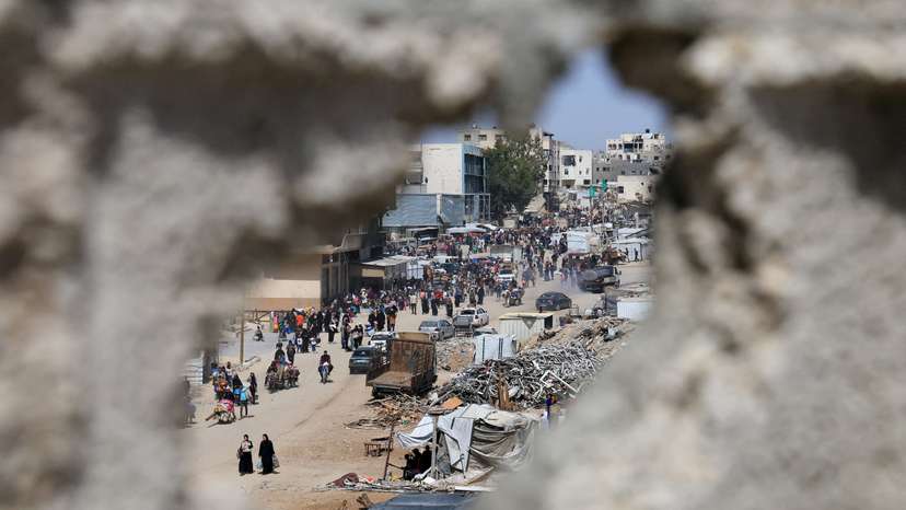 Palestinians flee after the Israeli military issued orders for evacuation from eastern Khan Younis