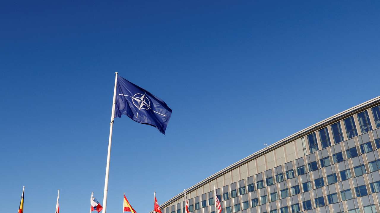 Flags fly outside NATO headquarters in Brussels