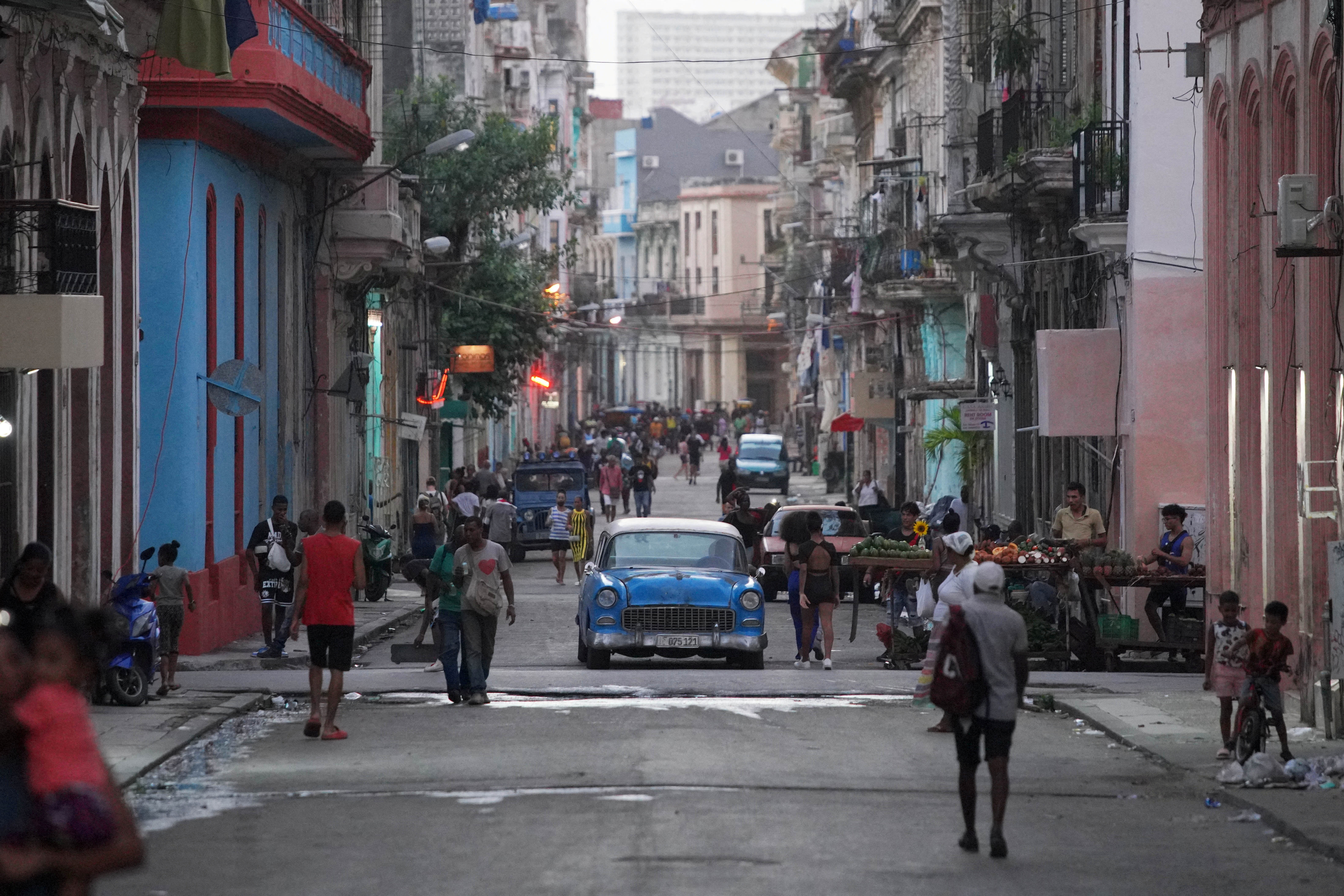 FILE PHOTO: People walk in downtown Havana