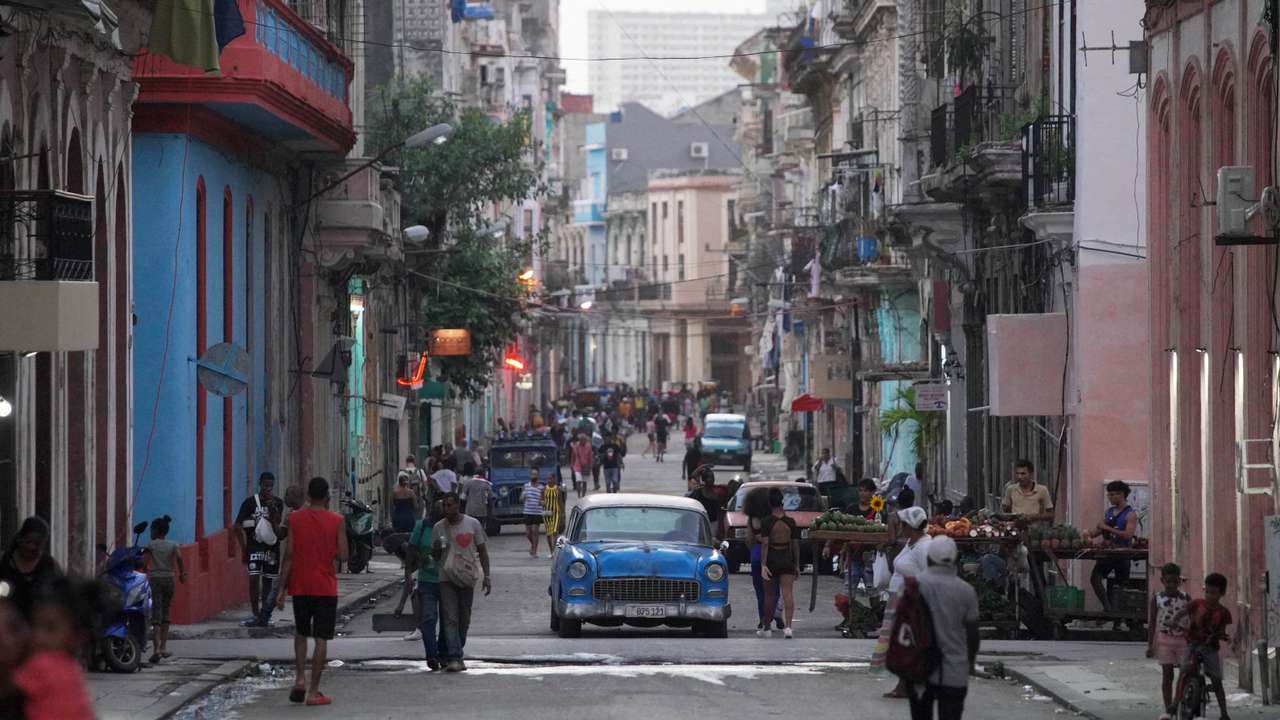 FILE PHOTO: People walk in downtown Havana